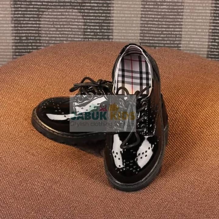 Boy's old check shoe